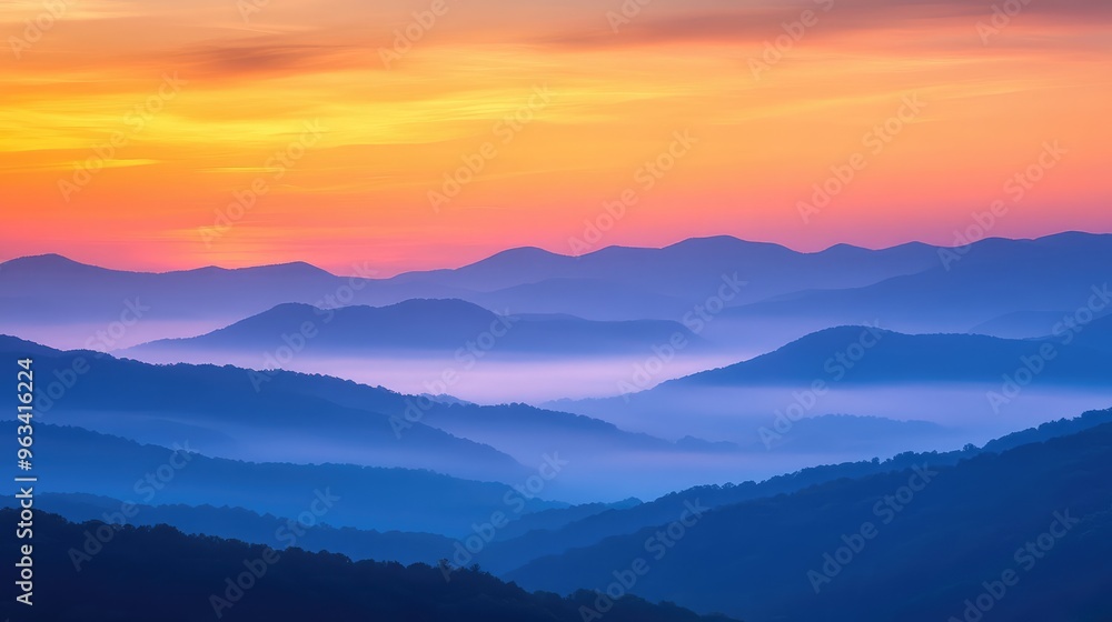 Sunset over the Blue Ridge Mountains, with layers of mist and warm hues filling the sky Sunset over the Blue Ridge Mountains, with layers of mist and warm hues filling the sky