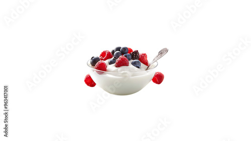 A bowl of mixed berries with a dollop of Greek yogurt and honey 