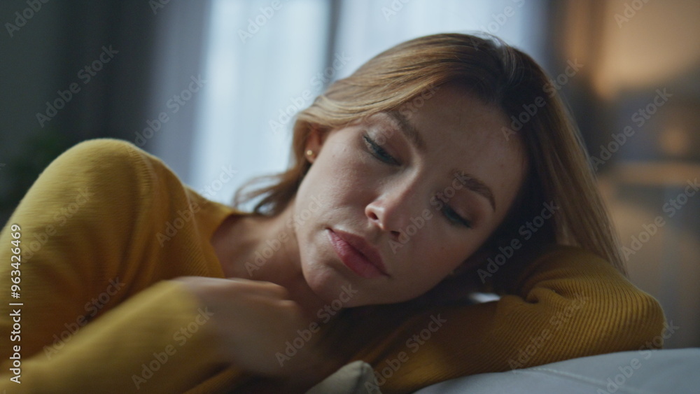 Sleepy woman receiving sms at sofa closeup. Excited lady reading phone message Sleepy woman receiving sms at sofa closeup. Excited lady reading phone message