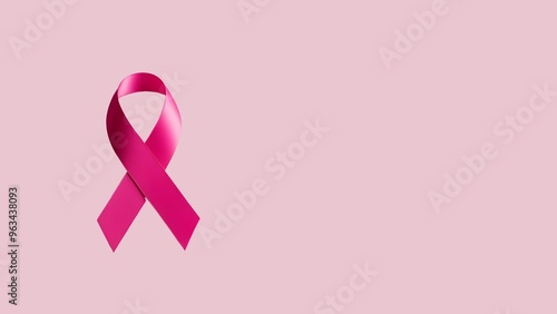 Pink ribbon on pink background with copy space
National Breast Cancer Awareness Month. photo