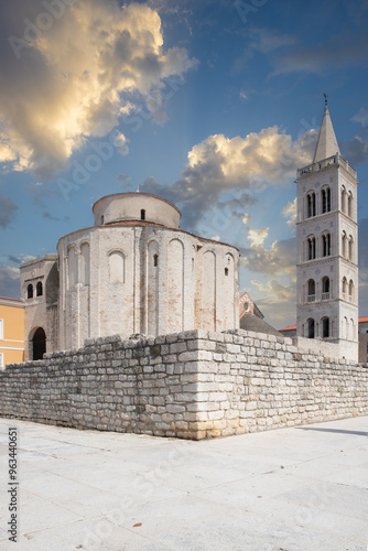 Roman Catholic Church of Saint Donatus from the Byzantine period in the historic center of an old town on the Mediterranean. Old round church made of white stone, Donatus of Zadar, Dalmatia, Croatia photo