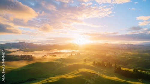 Bright sunrise over rolling hills
