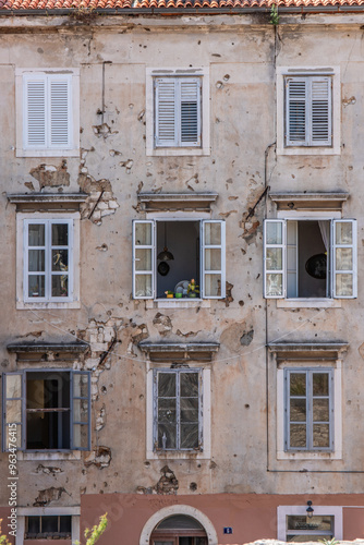 Streets, alleys and buildings of a historic Mediterranean old town on the Mediterranean Sea. A sunny day in the coastal town with a port on the Adriatic Sea, Zadar, Dalmatia, Croatia