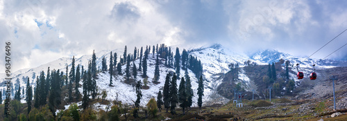 View of Apharwat Peak from Gulmarg Gondola ropeway at Kongdoori, Gulmarg, Jammu and Kashmir, India. Gulmarg Gondola is one of the highest in the world reaching 3,979 metres above sea level. photo