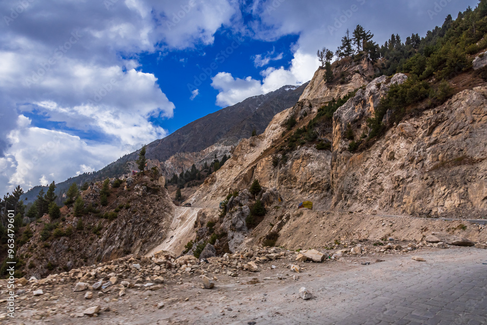 View enroute dangerous landslide prone roads en-route to Zoji la pass at elevation of 3528m in Pir Panjal himalayas mountain range on Srinagar Leh highway, Jammu and Kashmir, India. View enroute dangerous landslide prone roads en-route to Zoji la pass at elevation of 3528m in Pir Panjal himalayas mountain range on Srinagar Leh highway, Jammu and Kashmir, India.