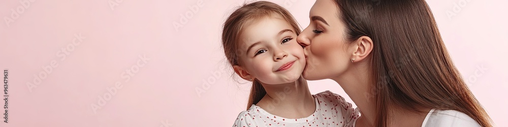 Happy cheerful charming cute woman in casual clothes with a 6-7 years old girl. Happy cheerful charming cute woman in casual clothes with a 6-7 years old girl.