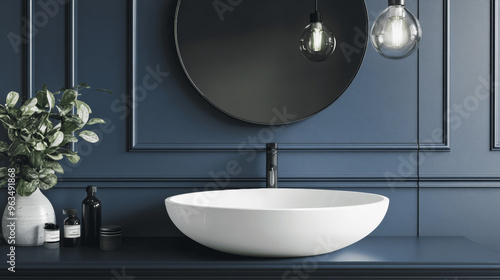 Modern Bathroom with White Vessel Sink on Dark Blue Vanity and Round Mirror