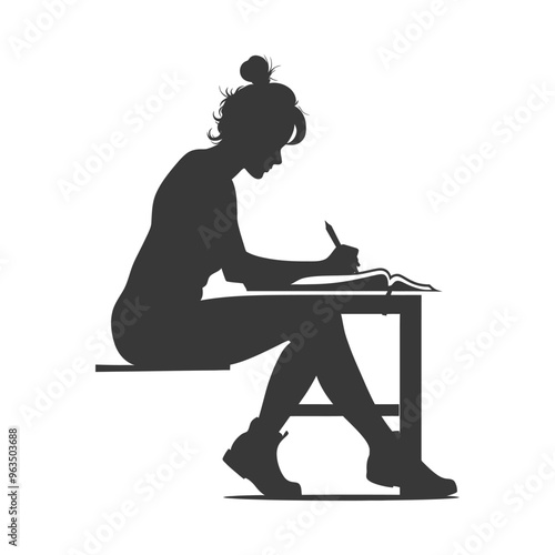 Silhouette of a Woman Sitting at a Desk and Writing