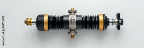 A high-quality black metallic shock absorber with gold accents, featuring a bellows design and a  adjustable knob. Ideal for automotive or industrial applications. This image conveys durability, preci photo