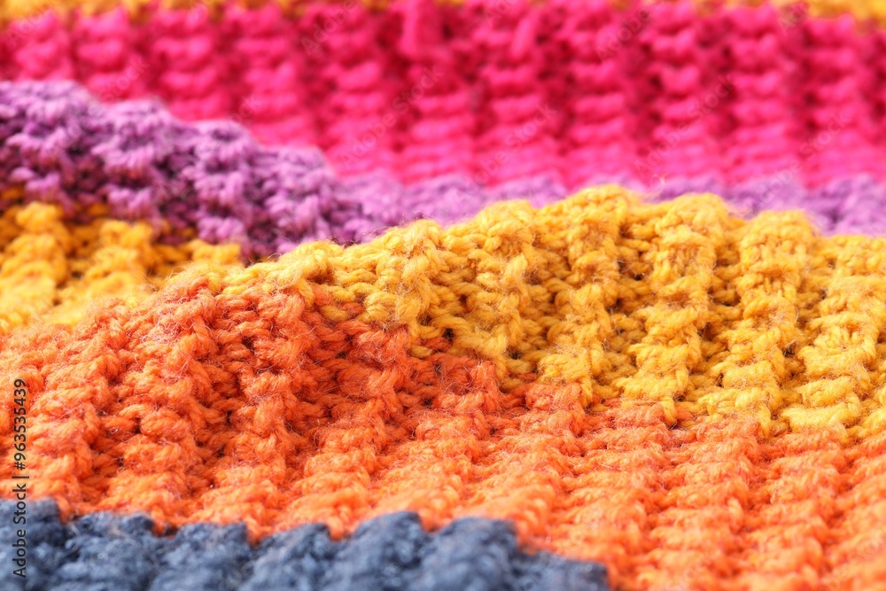 Fototapeta premium Texture of colorful knitted fabric as background, closeup