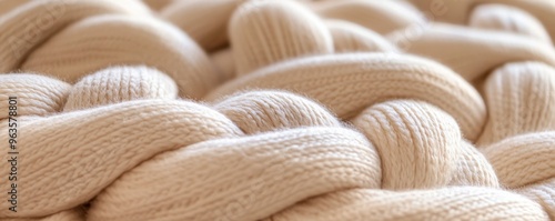 Close-up of beige chunky knit blanket