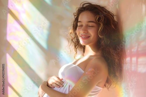 Happy Latina Pregnant Teen Embracing Sunlight Reflection in Ethereal Indoor Scene