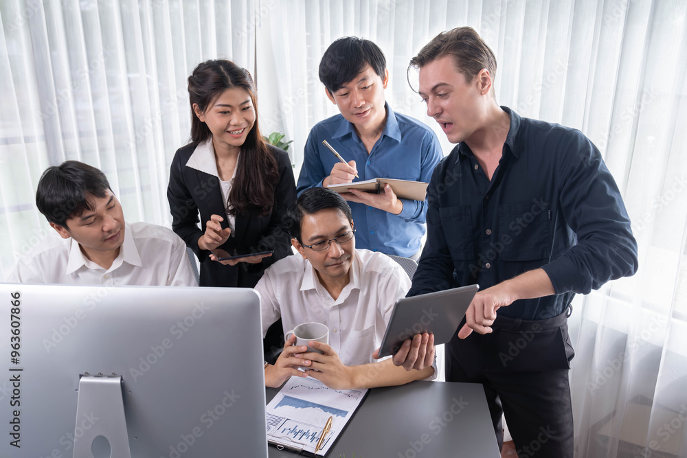 Group of diverse office worker employee working together on strategic business marketing planning in corporate office room. Positive teamwork in business workplace concept. Prudent Group of diverse office worker employee working together on strategic business marketing planning in corporate office room. Positive teamwork in business workplace concept. Prudent