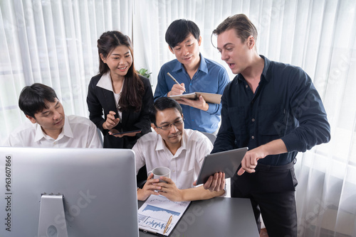 Group of diverse office worker employee working together on strategic business marketing planning in corporate office room. Positive teamwork in business workplace concept. Prudent