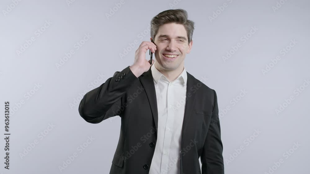 Smiling Mature Businessman Boss Talking By Phone, Smiling. 30s Guy On White Office Background. Smiling Mature Businessman Boss Talking By Phone, Smiling. 30s Guy On White Office Background.