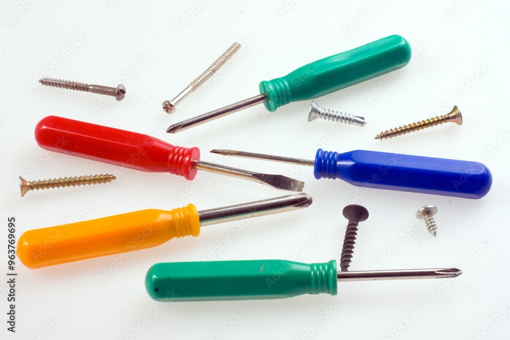 Colored Screwdrivers on white background Colored Screwdrivers on white background