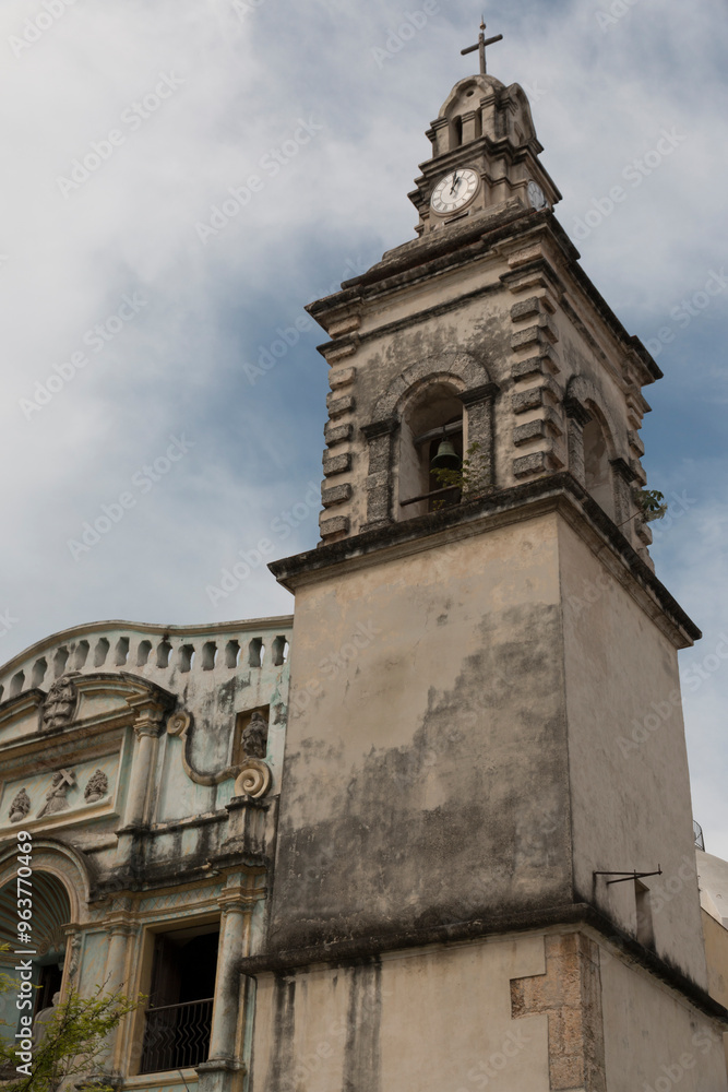 Cuba, Havana. Convento Belen, Christian Church Bell tower and clock tower. 2016-03-25 Cuba, Havana. Convento Belen, Christian Church Bell tower and clock tower. 2016-03-25