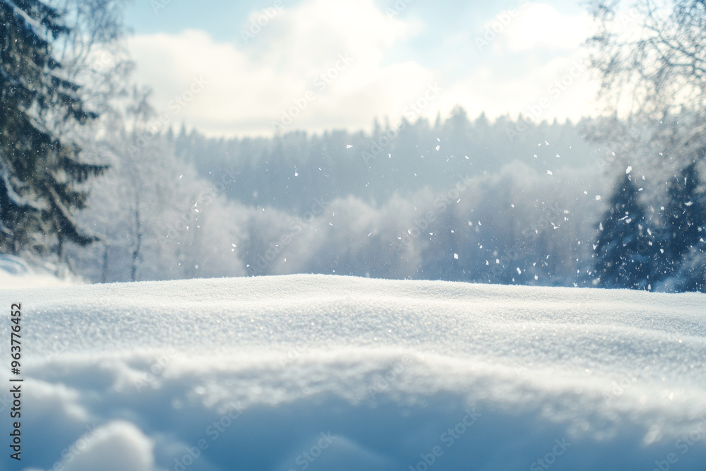Snowy landscape with soft snowdrifts and gentle falling snow, set against a blurred background of winter trees and a cloudy sky Snowy landscape with soft snowdrifts and gentle falling snow, set against a blurred background of winter trees and a cloudy sky