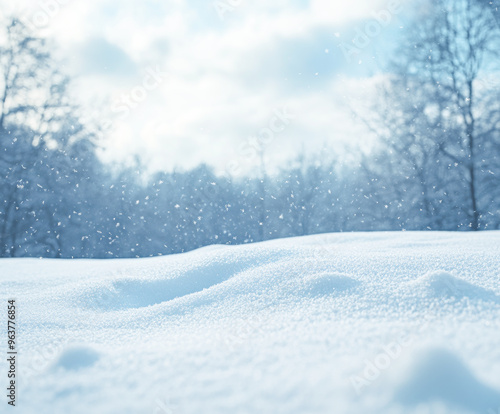 Wallpaper Mural Snowy landscape with soft snowdrifts and gentle falling snow, set against a blurred background of winter trees and a cloudy sky Torontodigital.ca