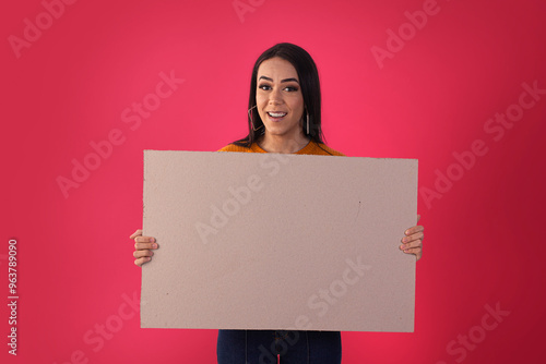  young woman holds advertising boards with facial expressions. photo