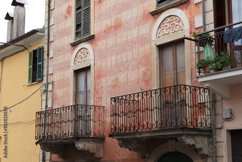 Central Italy Countryside Village House Facade with Iron Balconies photo