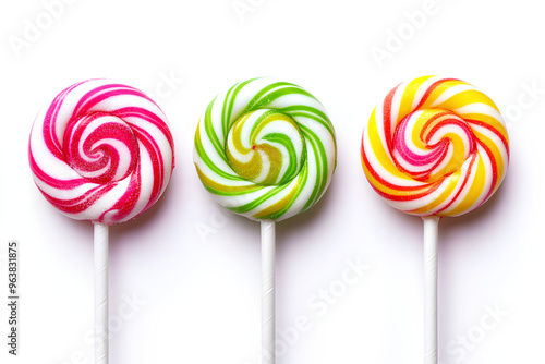 Three colorful swirl lollipops on white background.
