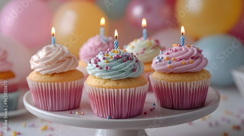 Beautifully Decorated Birthday Cupcake Stand with Vibrant Assortment of Treats