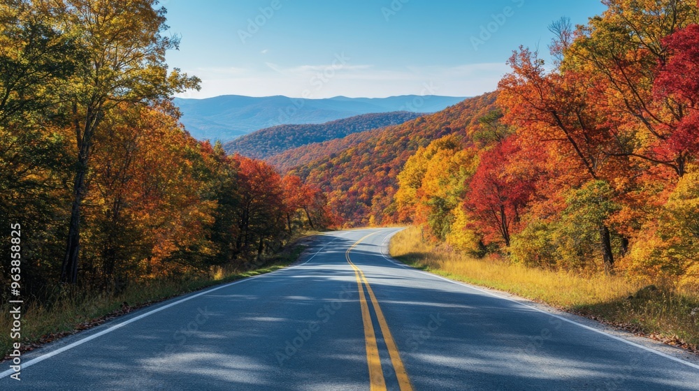 Winding Road Through Vibrant Autumn Foliage in a Mountainous Landscape Winding Road Through Vibrant Autumn Foliage in a Mountainous Landscape