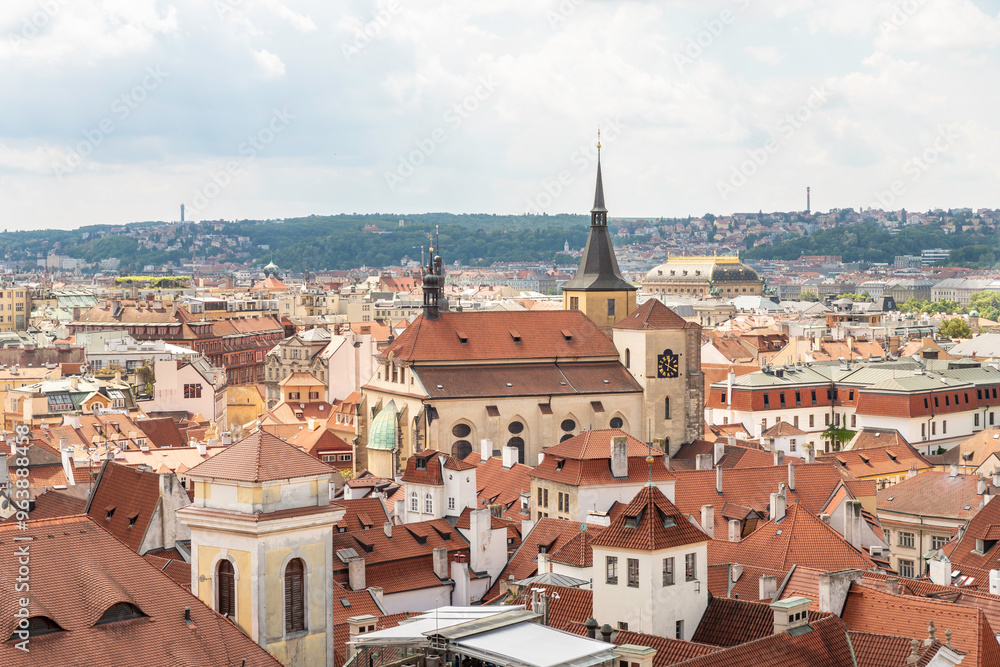 Fototapeta premium View of Church of St Giles and old town from observation platform of Old Town Hall in old part of Prague in Czech Republic