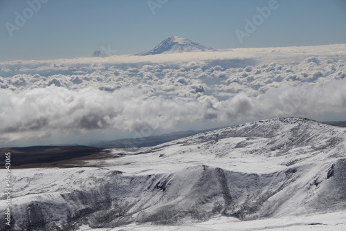Aerial view of the snow-capped Mount Kilimanjaro above the clouds in Tanzania, Africa