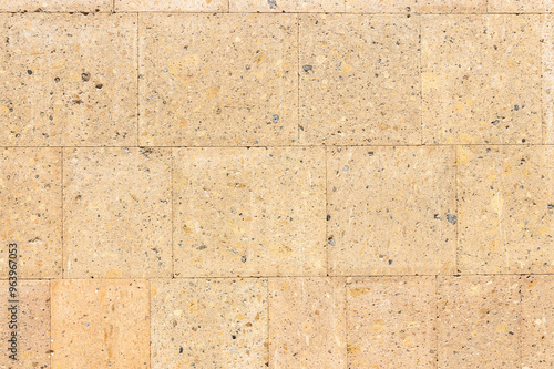 Billede på lærred polished light brown tuff stone tiles on wall