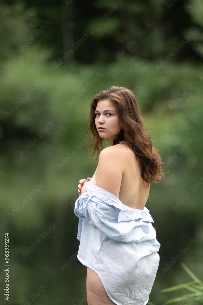 Beautiful young dark-haired girl by the river. Beautiful young dark-haired girl by the river.