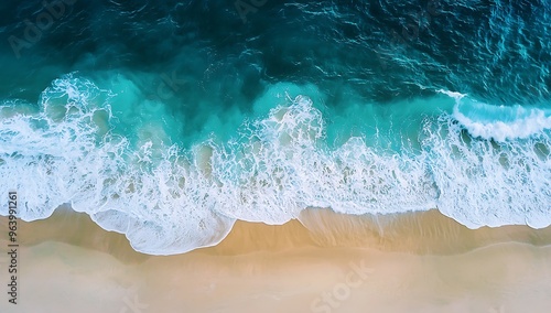 Aerial View of Tranquil Blue Ocean Waves and Sandy Beach