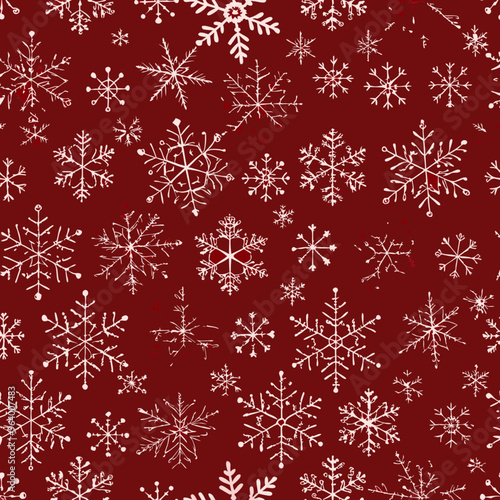Seamless winter pattern with white snowflakes on a festive red background

