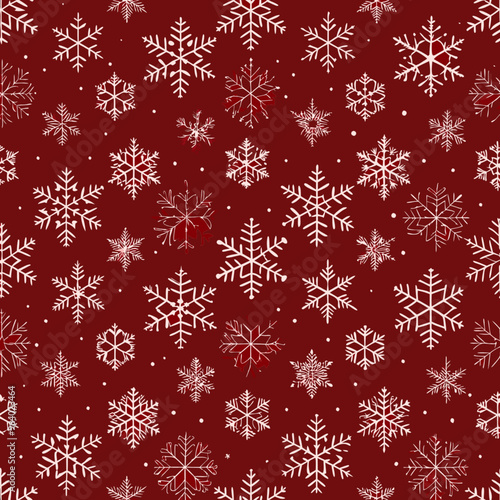 Seamless winter pattern with white snowflakes on a festive red background

