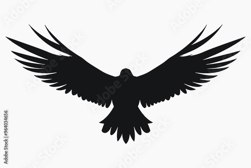 Majestic black bird silhouette soaring