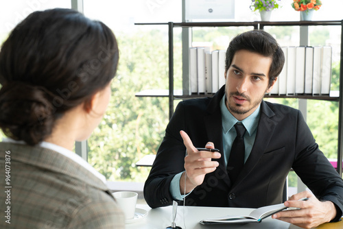 Businessman discussing working problems or interview someone for business plan with his colleague