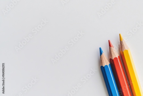Colorful pencils on blank canvas ready for creativity