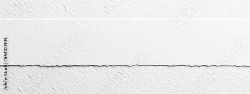 Seamless white watercolor paper texture background with a soft, grainy surface, viewed from the top, ideal for design and text with ample copy space. Flat lay of a clean, versatile backdrop.