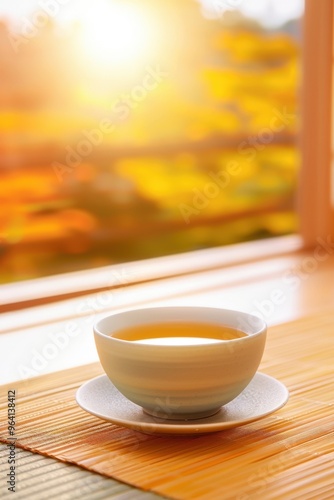 Serenity in a tea cup by the window, basking in warm autumn sunlight