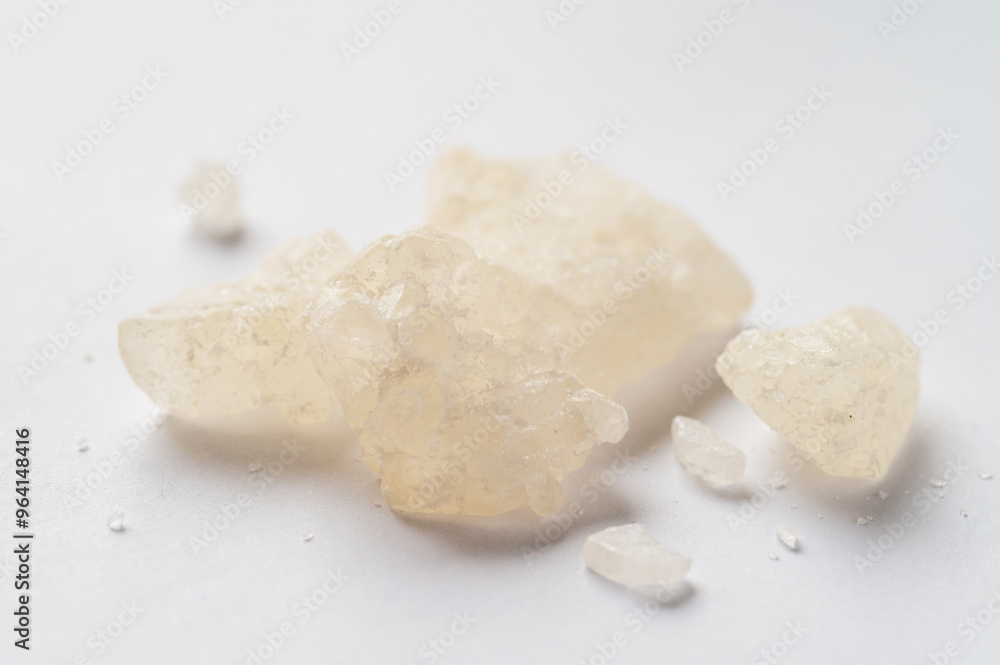 World Drug Day. World AIDS Day. crystal mephedrone designer drugs, bath salt on white background. World Drug Day. World AIDS Day. crystal mephedrone designer drugs, bath salt on white background.