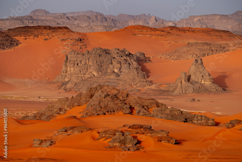 The Tadrart Rouge means Red Mountain. It is a mountain range in southeastern Algeria. The area has a rich array of rock art. photo