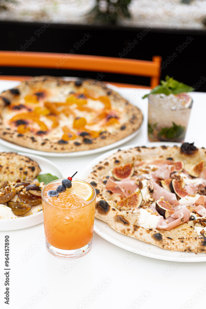 Pizza with figs and fresh drinks Pizza with figs and fresh drinks