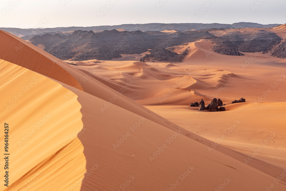 The Tadrart Rouge means Red Mountain. It is a mountain range in southeastern Algeria. The area has a rich array of rock art. The Tadrart Rouge means Red Mountain. It is a mountain range in southeastern Algeria. The area has a rich array of rock art.