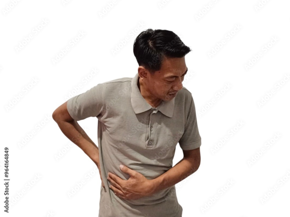 young asian man posing on a white backdrop wearing gray polo t shirt hands holding stomach, having a liver pain, stomach ache. young asian man posing on a white backdrop wearing gray polo t shirt hands holding stomach, having a liver pain, stomach ache.