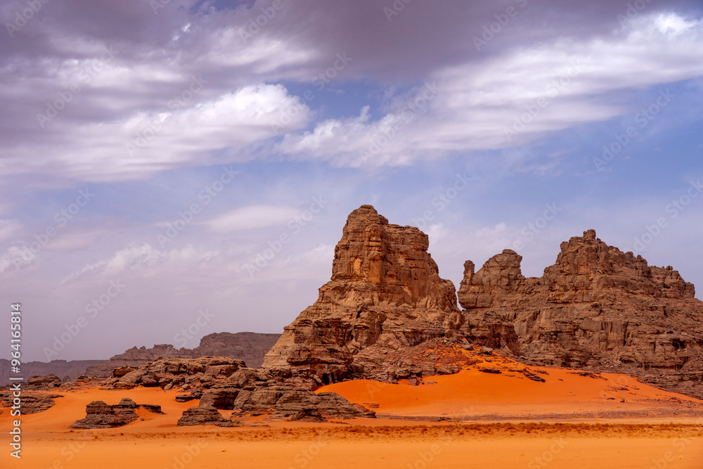 The Tadrart Rouge means Red Mountain. It is a mountain range in southeastern Algeria. The area has a rich array of rock art. The Tadrart Rouge means Red Mountain. It is a mountain range in southeastern Algeria. The area has a rich array of rock art.