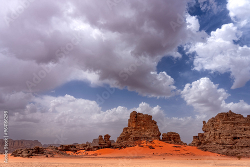 The Tadrart Rouge means Red Mountain. It is a mountain range in southeastern Algeria. The area has a rich array of rock art. photo