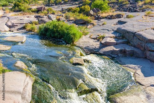 View on Tokovsky waterfalls and rapids on the Kamianka river. Dnipropetrovsk region, Ukraine photo