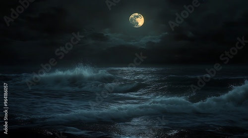 A full moon hangs high in the night sky, casting an ethereal glow on the dark, choppy ocean.