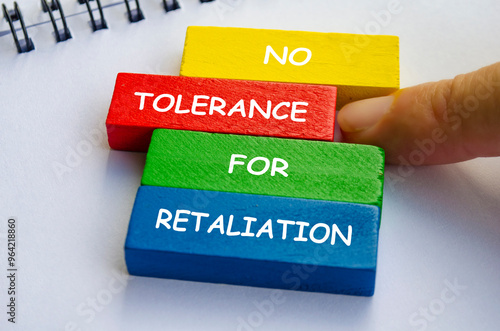 No Tolerance for Retaliation text on multicolored wooden blocks. No to negativity concept